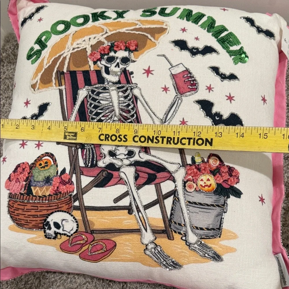 Cupcakes & Cashmere Skeleton Holiday Pillow - Pink and White
